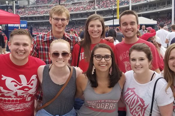 Wisconsin in Washington students wearing Badger gear at sporting event