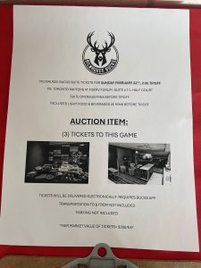 *Image of paper with auction item*