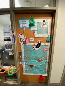 *Door decorated with penguin, snowman, polar bear on ice rink*