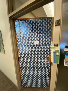 *Door wrapped in snowman wrapping paper*