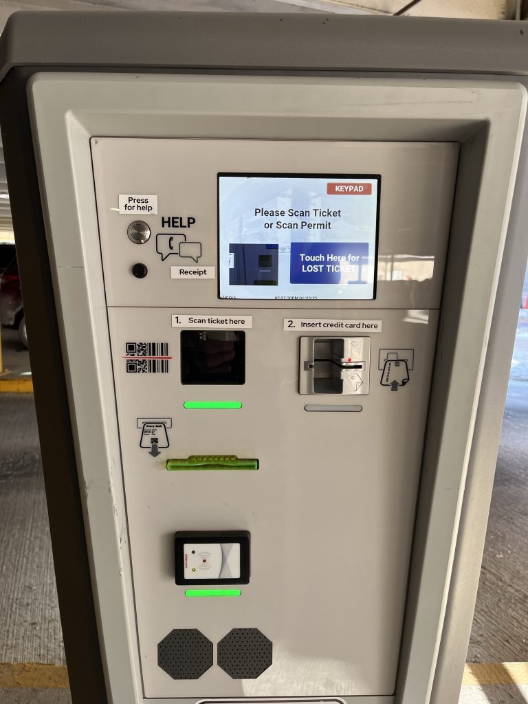 Close-up photo of a lot exit kiosk at a parking garage.