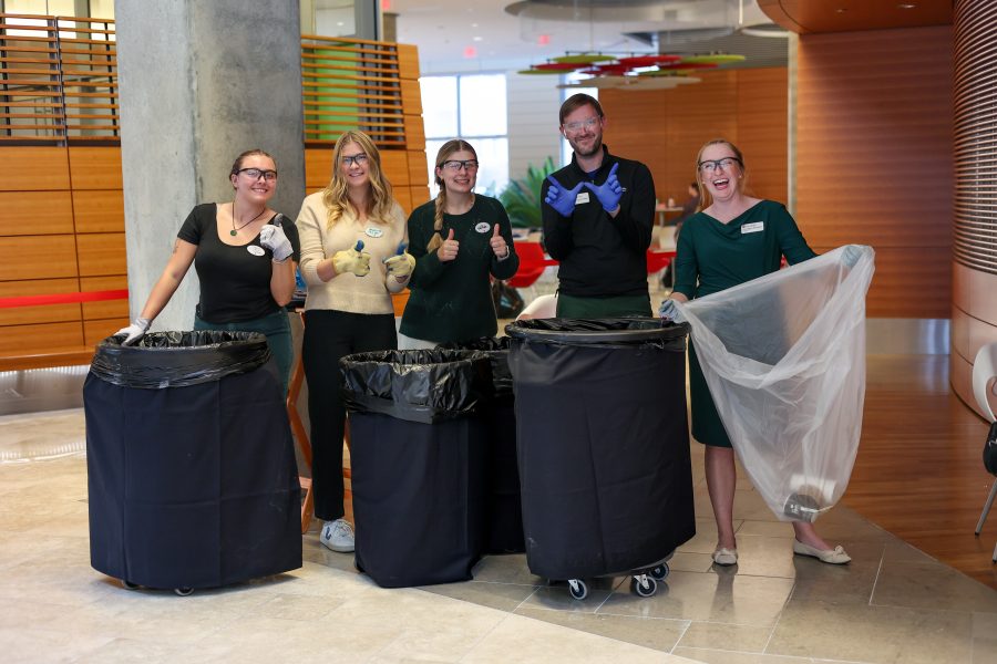 Student interns along with Tim Lindstrom and Audrey Stanton conducting a waste audit at the 2024 Sustainability Symposium