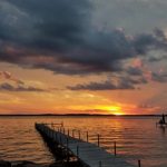 Sun setting low in sky over Lake Mendota