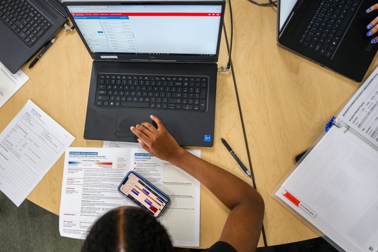 UW student working at a laptop