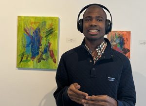 Blake Edison with his artwork