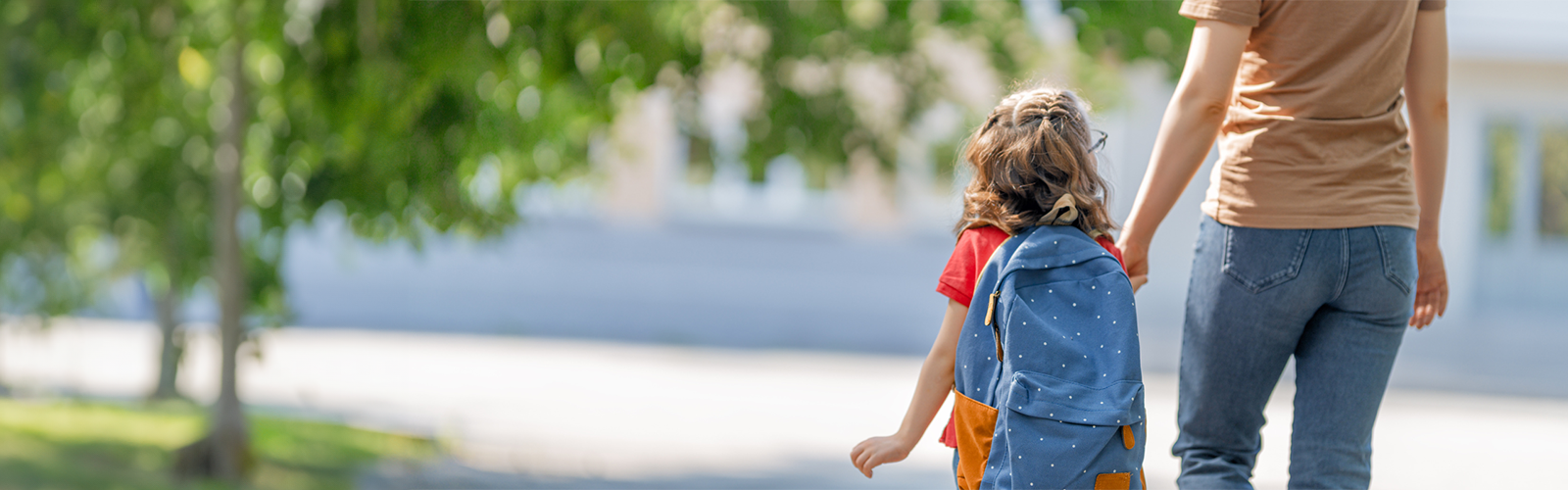 Girl walking with mother