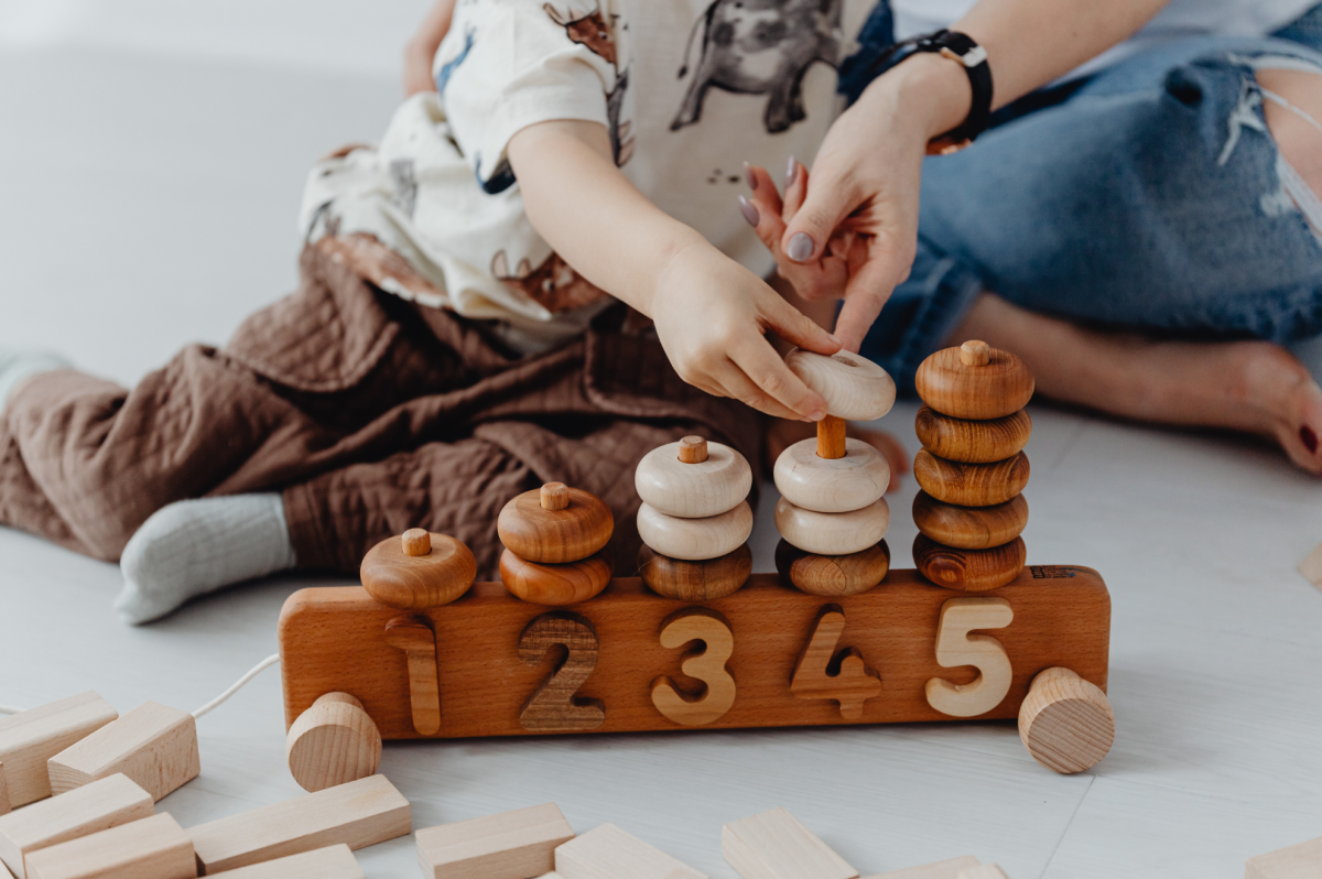 Boy and parent playing