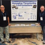 -Josh Lapin (left) and Michael Truman (right) presenting the statewide Managing Threatening Confrontations trainings at an AUCD conference